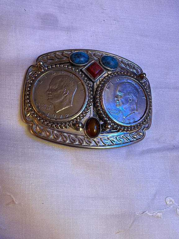 Metal belt buckle with two Eisenhower dollar coins dated 1972 and decorative cabochon stones