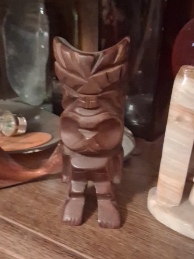 Hand-carved wood Hawaiian Tiki statue depicting Ku