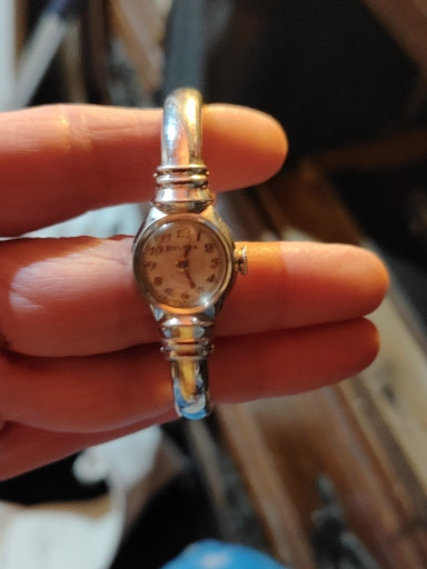 Vintage ladies' wristwatch with two-tone gold and silver expansion bracelet