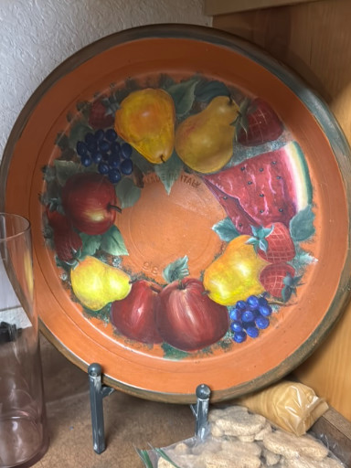 Hand-painted decorative ceramic plate with fruit motif
