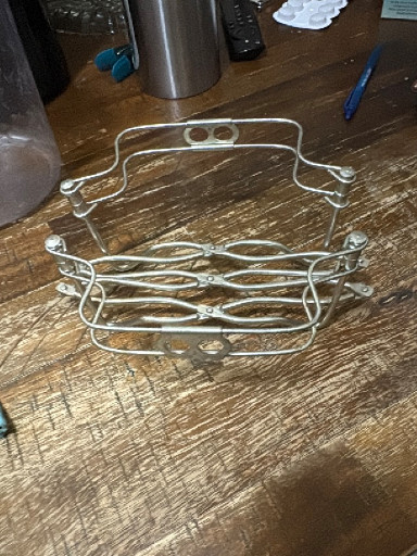 Chrome-plated metal expandable trivet and casserole holder, made in Italy