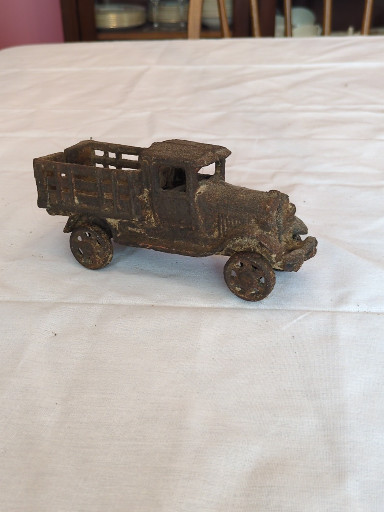 Cast iron toy stake truck, circa 1920s-1930s