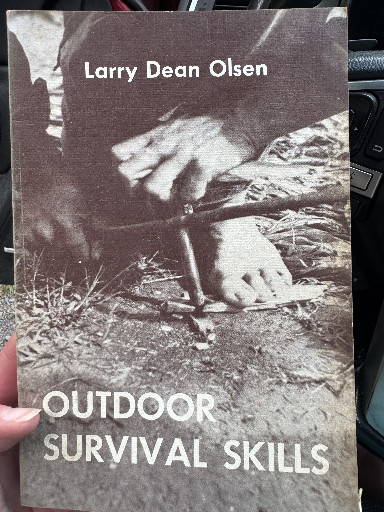 Book titled 'Outdoor Survival Skills' by Larry Dean Olsen