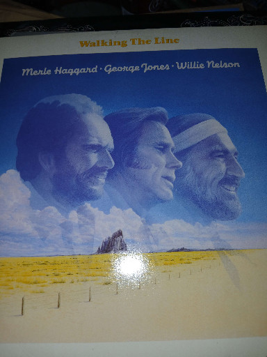 Vinyl LP compilation album titled 'Walking The Line' by Merle Haggard, George Jones, and Willie Nelson