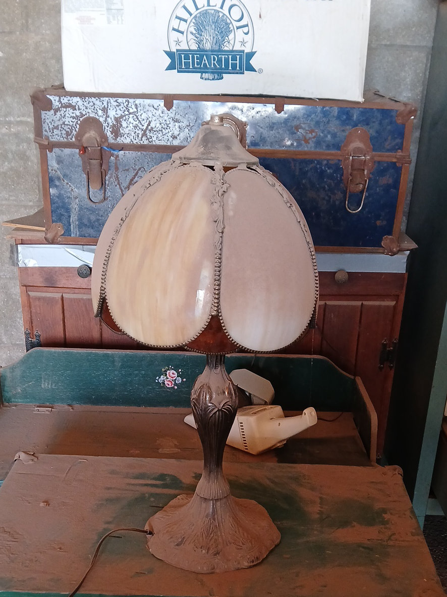 Bronze table lamp with slag glass shade