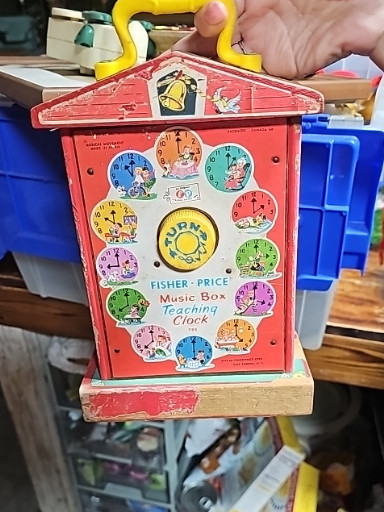 Plastic toy 'Music Box Teaching Clock' #998 by Fisher-Price