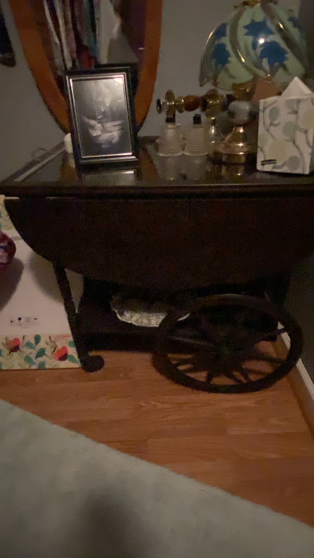 Mahogany tea cart with drop-leaf sides and wheels by Paalman Furniture Co.