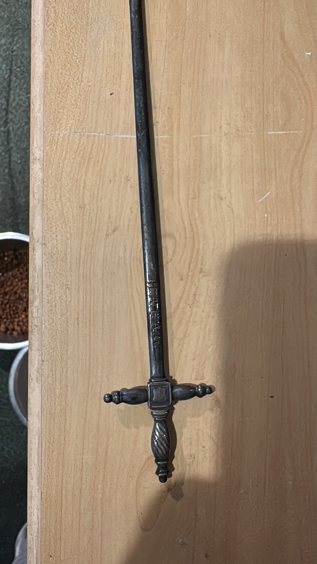 Metal letter opener with decorative handle