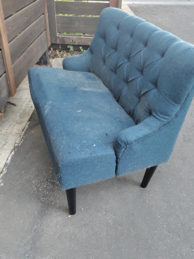 Mid-century modern style tufted loveseat with button-tufted backrest