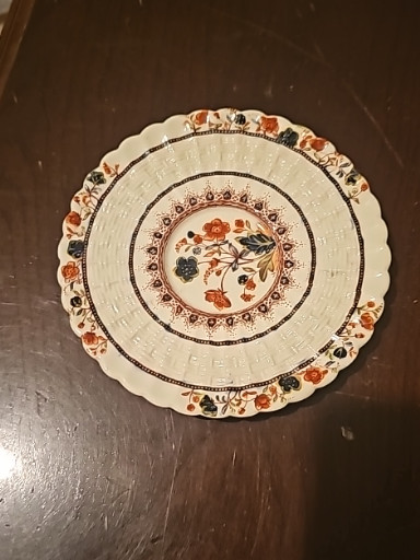 Porcelain demitasse saucer in the 'Mandalay' pattern by Copeland Spode