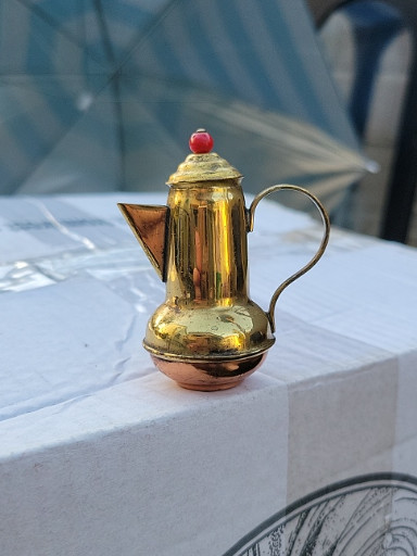 Brass and copper miniature coffee pot with red finial