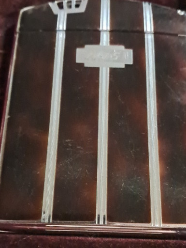 Tortoiseshell and chrome cigarette case with integrated lighter by Ronson