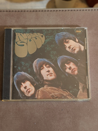 CD album titled 'Rubber Soul' by The Beatles