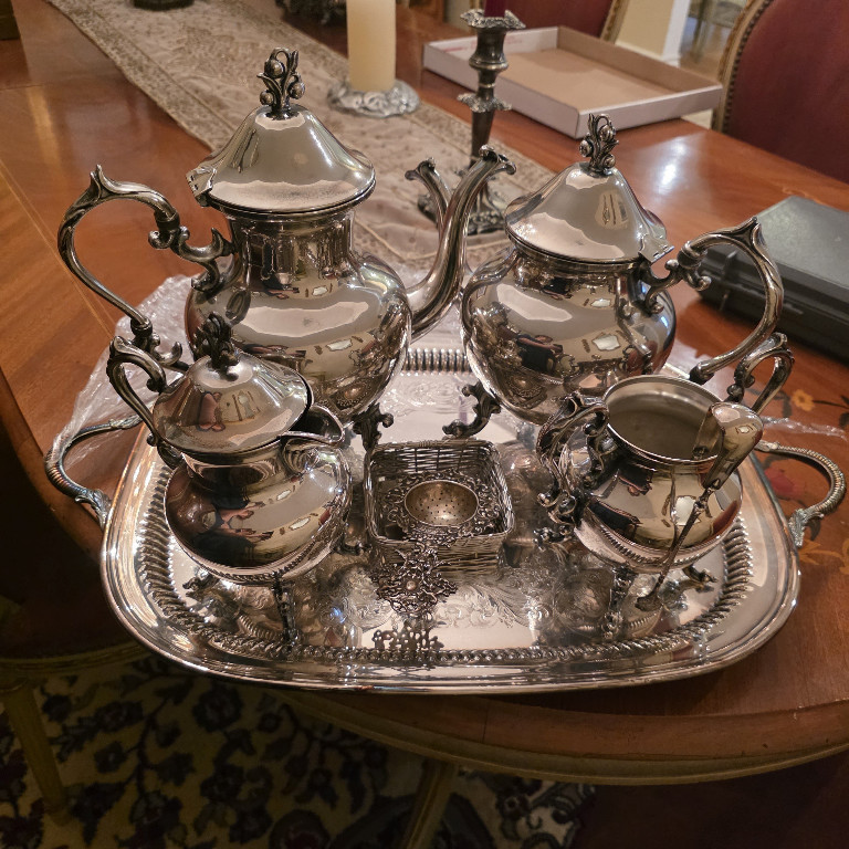 Silver-plated tea and coffee service set with ornate Victorian-style decoration