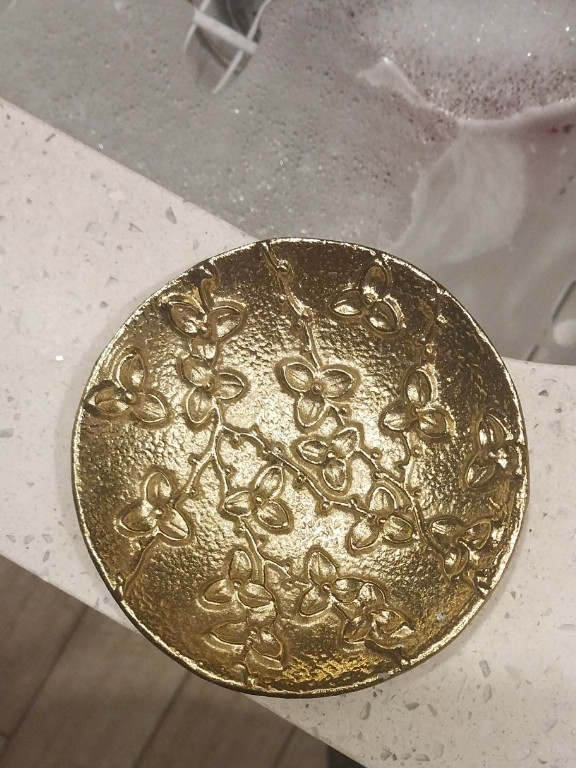 Brass decorative dish titled 'Bittersweet Catch All' by Michael Aram