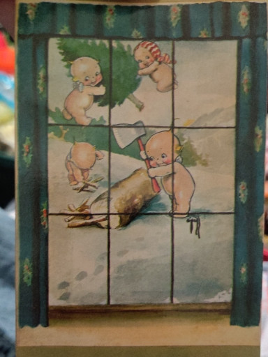 Vintage postcard titled 'Christmas Kewpies' by Rose O'Neill