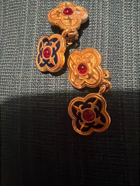 Gold-tone metal clip-on earrings with red cabochon centers in Etruscan revival style
