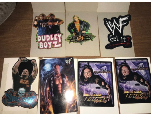 Collection of seven WWF (World Wrestling Federation) vending machine stickers from circa 2000, featuring Dudley Boyz, Triple H, and WWF logo