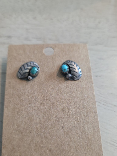 Sterling silver stud earrings with turquoise stones by Native American artist