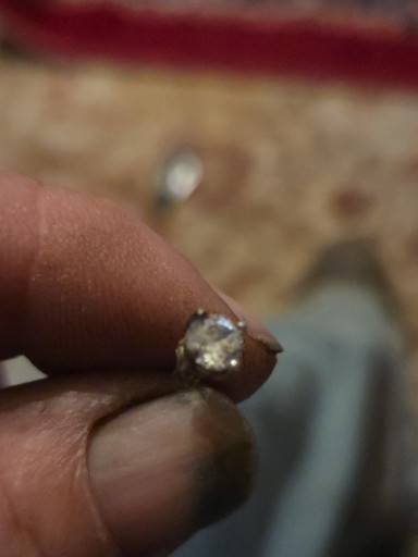 Modernist ring with clear gemstone (likely rock crystal or quartz) set in metal