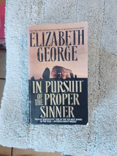 Paperback book titled 'In Pursuit of the Proper Sinner' by Elizabeth George