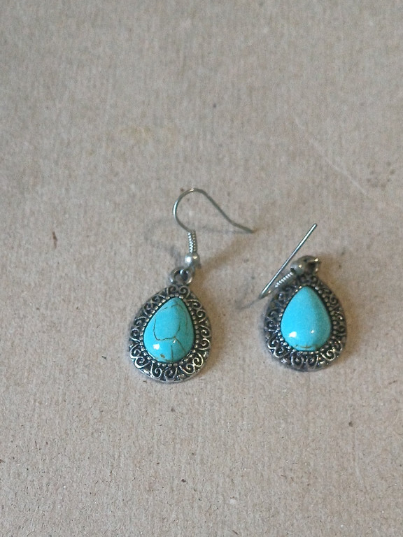 Silver filigree earrings with turquoise cabochon stones