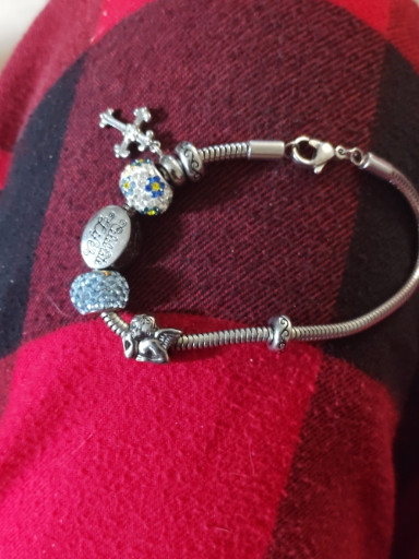 Hallmark silver-tone snake chain charm bracelet with elephant, cross, and crystal charms