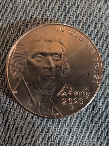 2023-P Jefferson Nickel with die chip on reverse