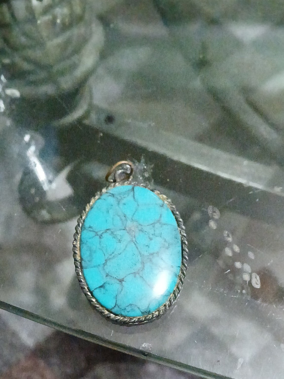 Sterling silver pendant with turquoise stone