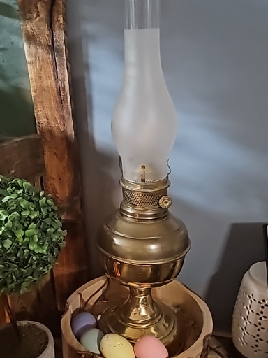 Brass oil lamp converted to electric with frosted glass chimney