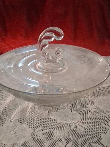 Clear pressed glass center-handle serving tray in the 'Coronet' pattern by Fostoria Glass Company