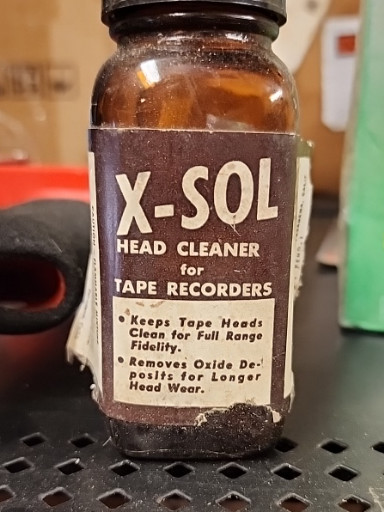 Glass bottle of X-SOL Head Cleaner for Tape Recorders, vintage audio maintenance product