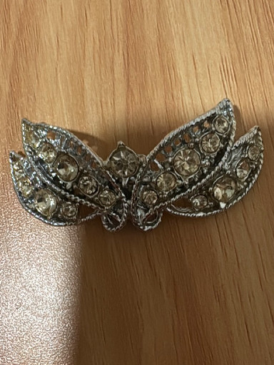 Vintage rhinestone butterfly brooch in silvertone metal