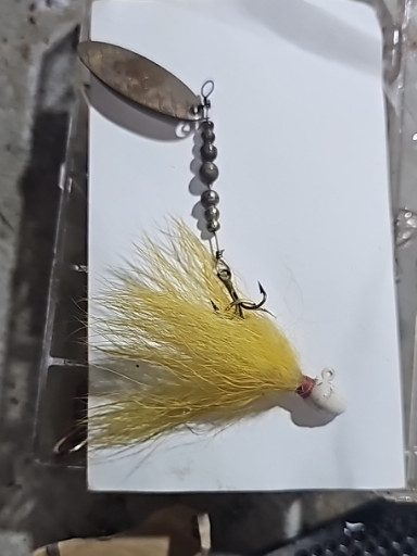 Vintage tandem bucktail spinner fishing lure with chartreuse hair and silver blade