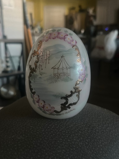 Hand-painted glass decorative egg with gazebo motif by Fenton