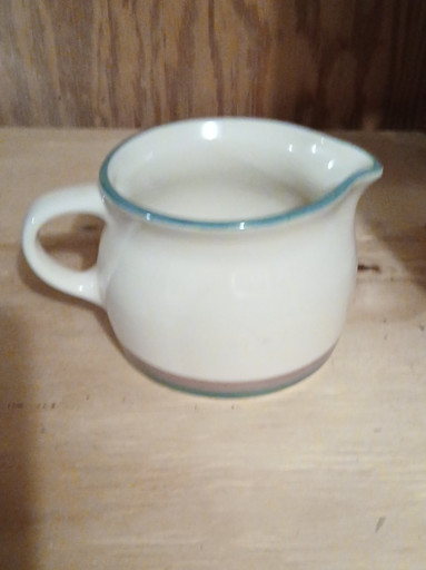Ceramic gravy boat from the 'Juniper' pattern by Pfaltzgraff