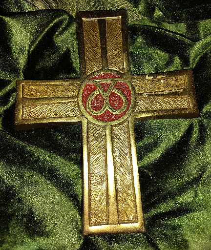 Brass wall cross with red enamel marriage rings symbol, copyright 1966 by Terra Sancta Creations