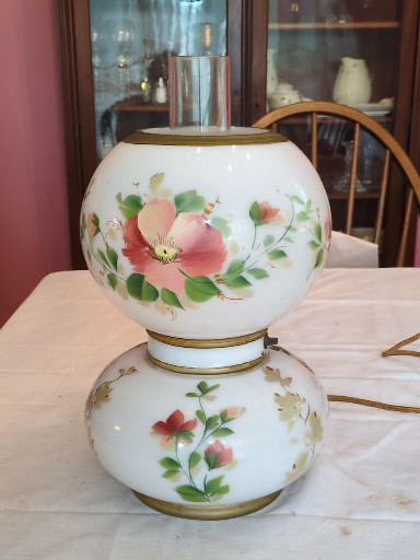 Milk glass 'Gone with the Wind' style lamp with hand-painted floral decoration