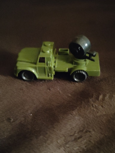 Plastic toy military truck with searchlight by Hasbro
