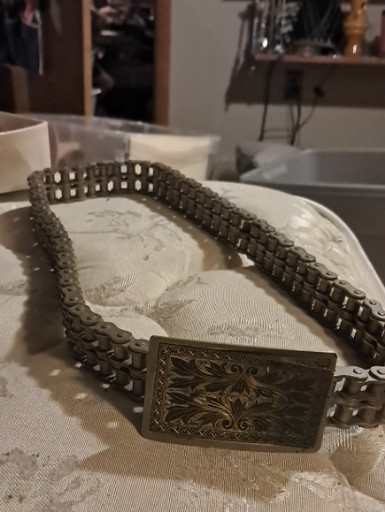 Vintage motorcycle chain belt with engraved rectangular buckle