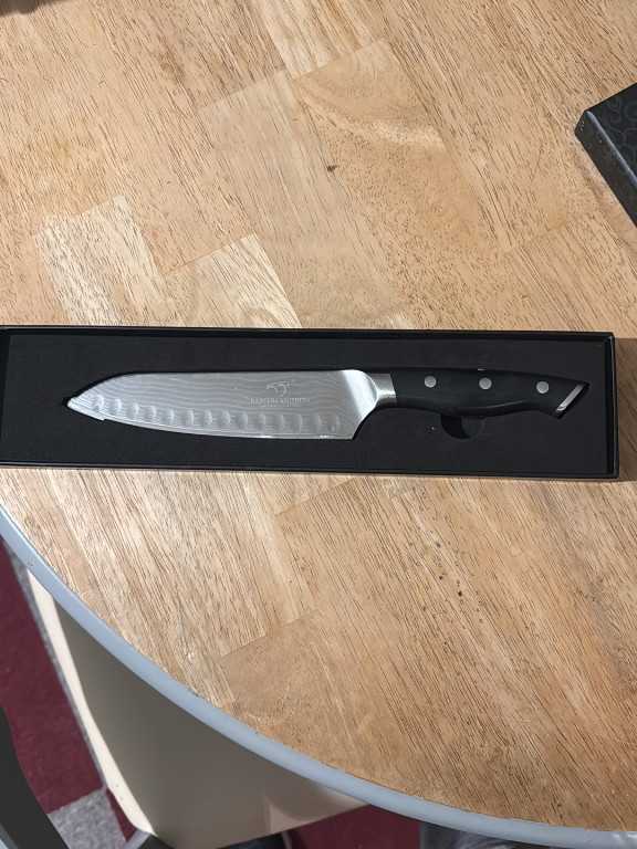 Cangshan D Series Santoku Knife with Damascus pattern blade and black handle