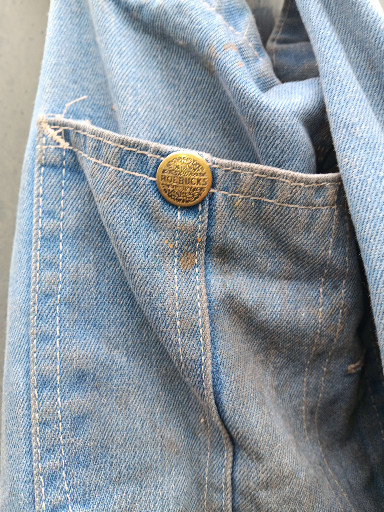 Vintage denim workwear garment with Sears Roebuck 'Union Made' button