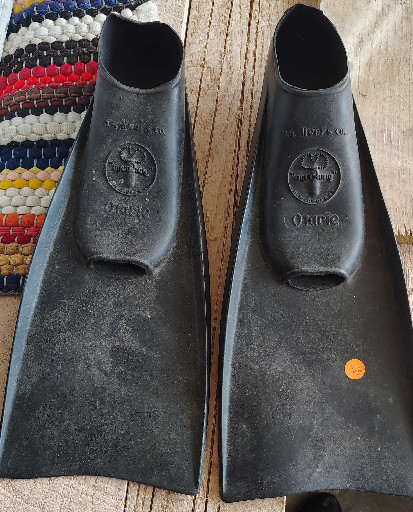 Vintage rubber swim fins titled 'Otarie' by Aqua Lung US Divers