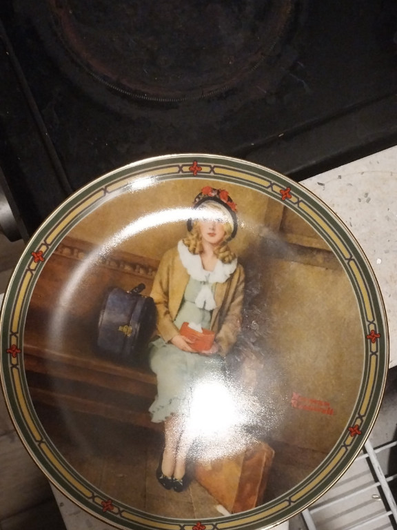 Porcelain collector plate titled 'A Young Girl's Dream' by Norman Rockwell for Knowles