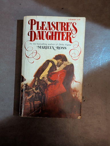 Paperback novel titled 'Pleasure's Daughter' by Marilyn Ross