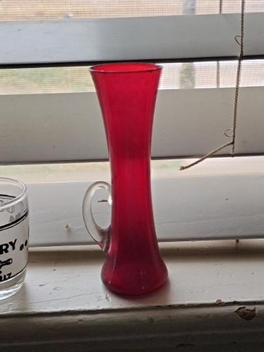 Red glass bud vase with applied clear handle