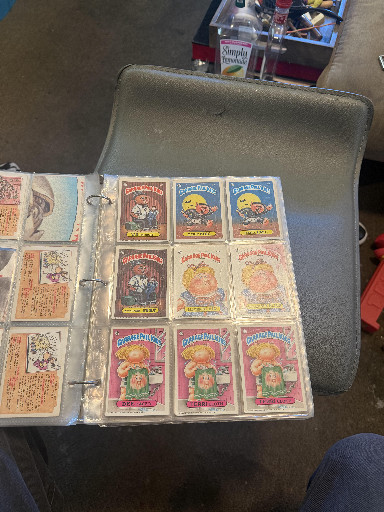Collection of vintage Garbage Pail Kids trading cards from 1980s series by Topps