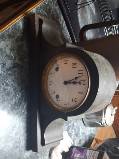 Wooden tambour-style mantel clock by William Gilbert Clock Company