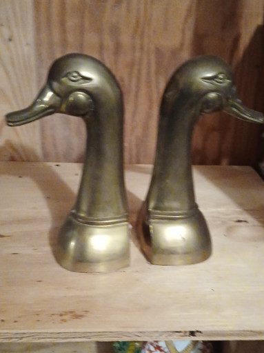 Pair of brass duck head bookends