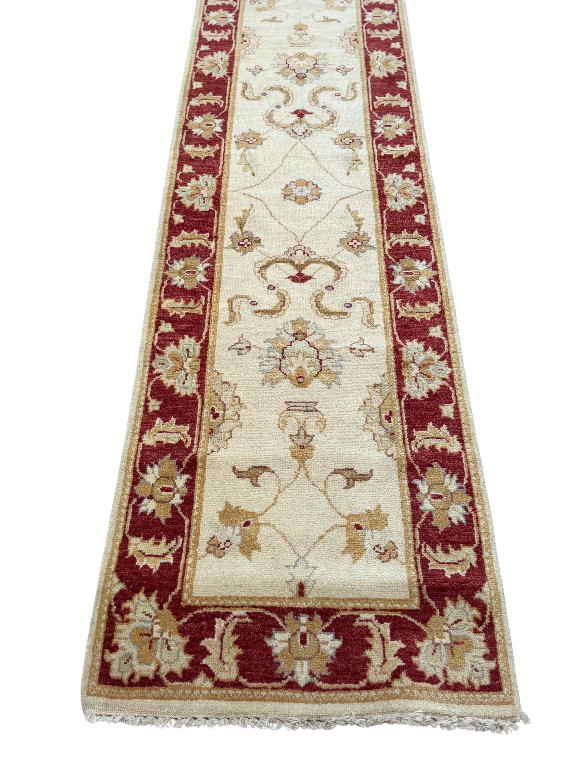 Wool runner rug with traditional Persian design by SAFAVIEH